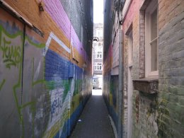 Verborgen straatje met zicht op de Elandsgracht